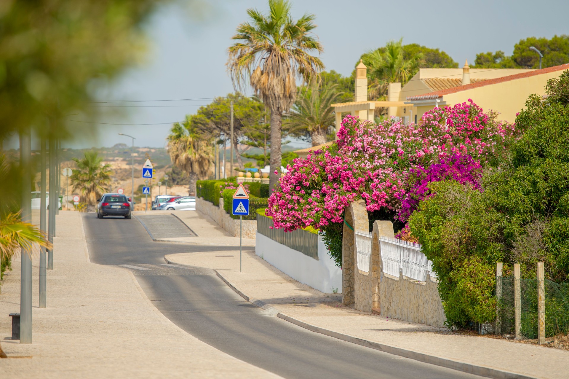 sunny morning on the street near Praia do Carvoeiro, Algarve, Portugal